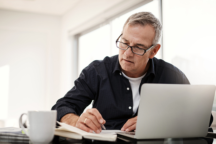 Man Working on Taxes